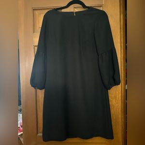 Little black dress with puffy sleeves